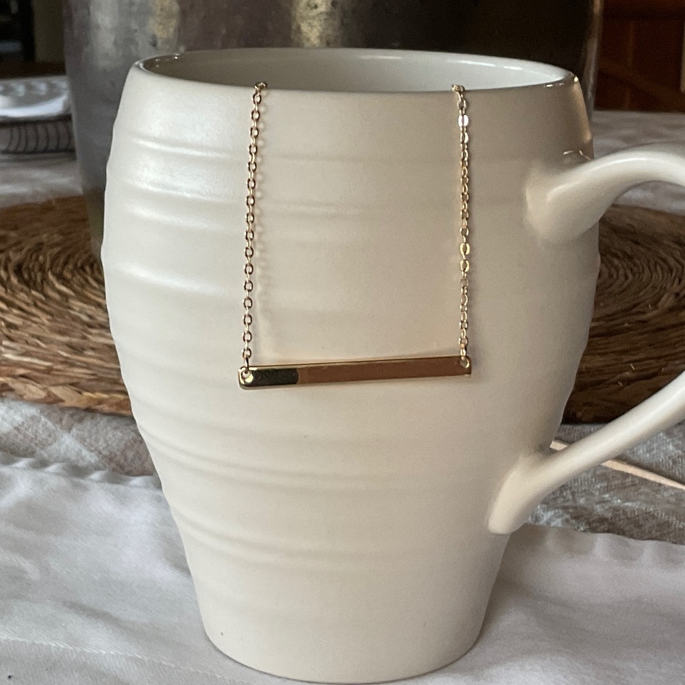 22” adjustable gold tone bar necklace